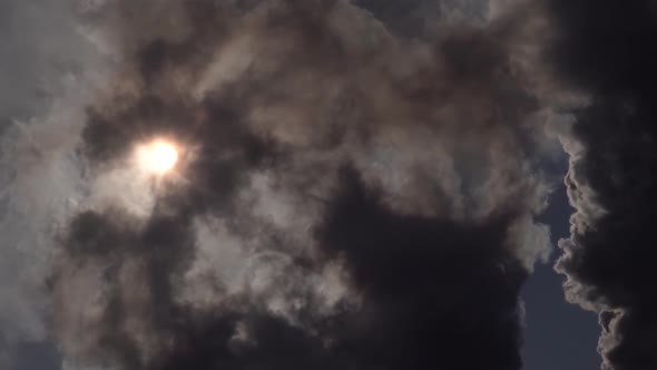 Sun Covered By Black Clouds of Smoke