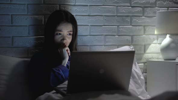 Girl Impatiently Waiting File Download, Working on Laptop at Night Slow Internet