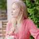 Young Woman Drinking Coffee in Park - VideoHive Item for Sale