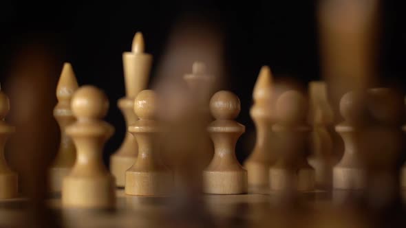 Close Up of Black Chess Pieces on Board