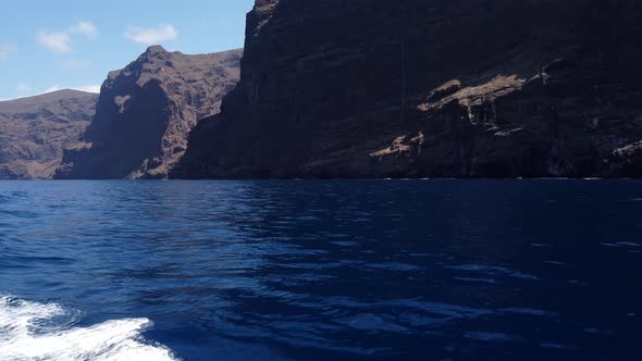 Rocks of Los Gigantes and Atlantic Ocean from Yacht, Tenerife, Spain