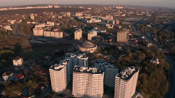 Establishing Orbiting Aerial Shot of Chisinau Moldova at Sunset