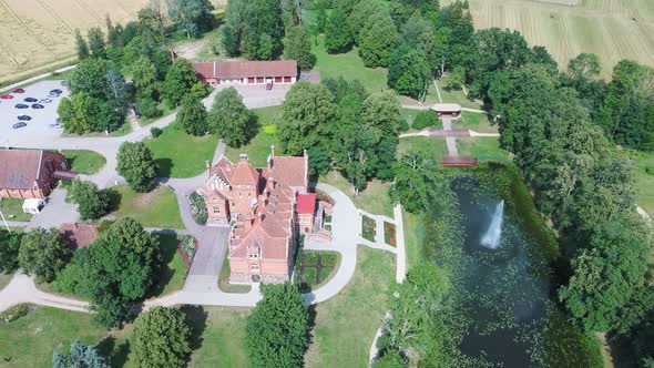 Jaunmoku Brick Medieval Castle Near Tukums, Latvia  Aerial Dron 4k Shot Jaunmokas Manor Park.