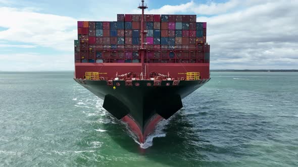 Container Ship Seen From the Bow Carrying International Cargo