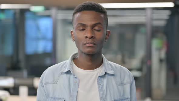 Portrait of African Man Looking at Camera