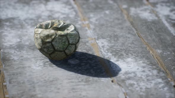 Old Soccer Ball the Cement Floor alt
