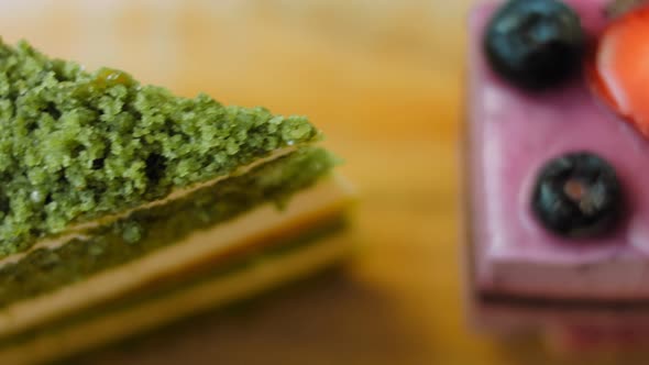 Pieces of Different Cakes on a Retrostyle Baking Tray