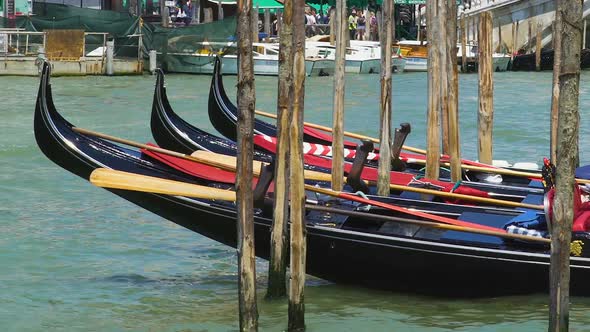Decorated Gondolas Swaying at Pier, Water Taxi in Venice as Tourist Attraction