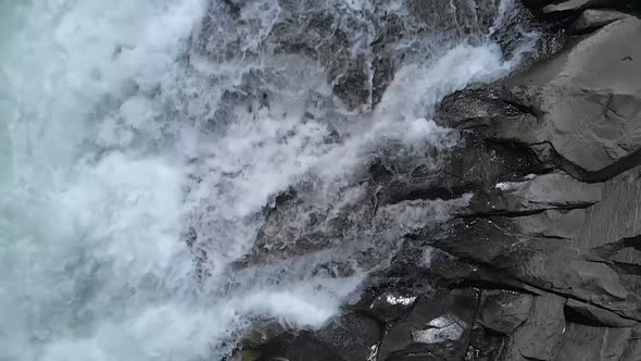 Powerful Mountain River Flowing Over Stones