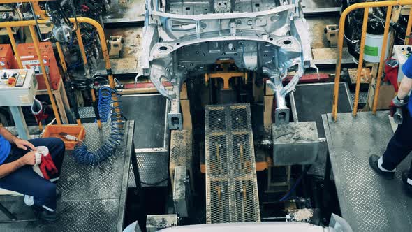 Car Moving Along the Assembly Line at a Car Factory