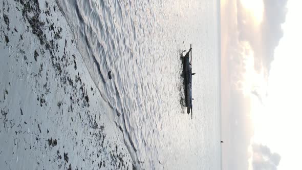 Tanzania Vertical Video  Boat Boats in the Ocean Near the Coast of Zanzibar Aerial View