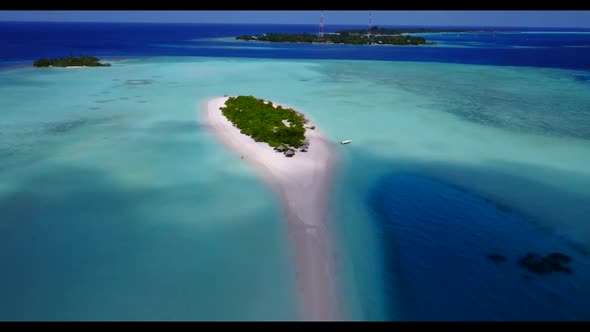 Aerial top view panorama of relaxing resort beach holiday by transparent ocean with clean sand backg