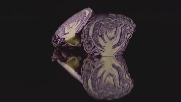 Purple Cabbage Turning On A Mirror.