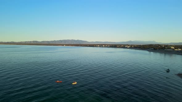 kayak pair exploring la paz bay in mexico