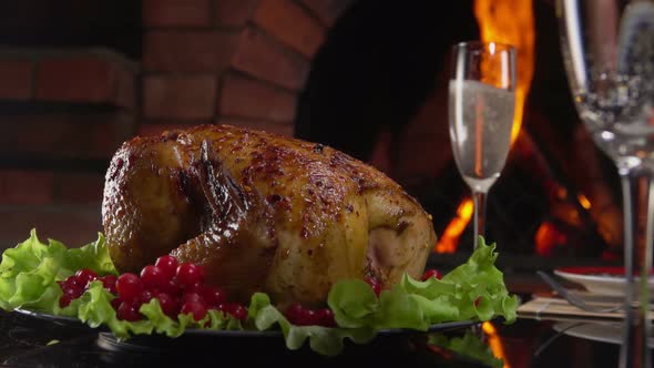 Chicken on the Salad on Background of Fireplace