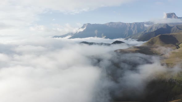 Aerial View of mountains in the clouds, Maluti A Phofung NU, Free, South Africa.