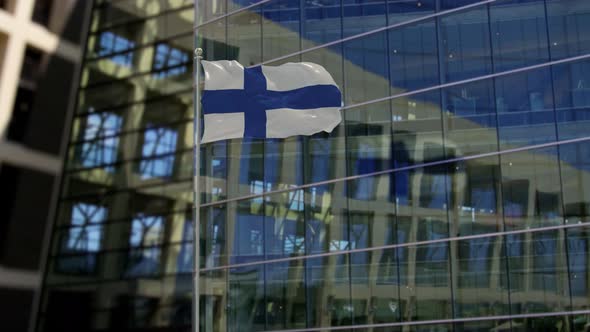 Finland Flag Waving On A Skyscraper Building