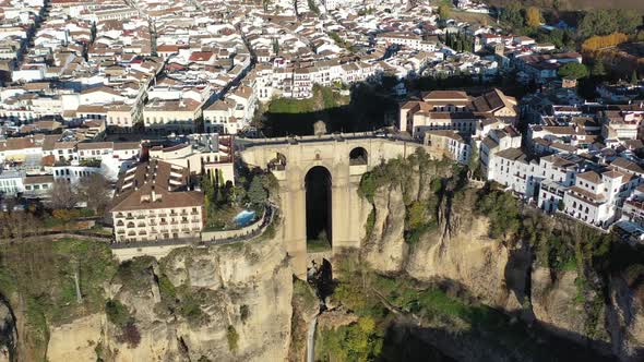 Village of Ronda Spain with Puente Nuevo arch bridge part of the Málaga Andalucia province, Aerial p