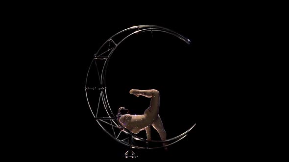 Acrobat Rotating Design in the Form of a Moon