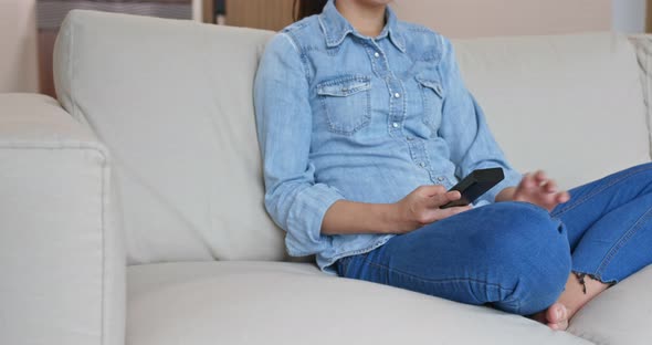 Woman watch tv at home