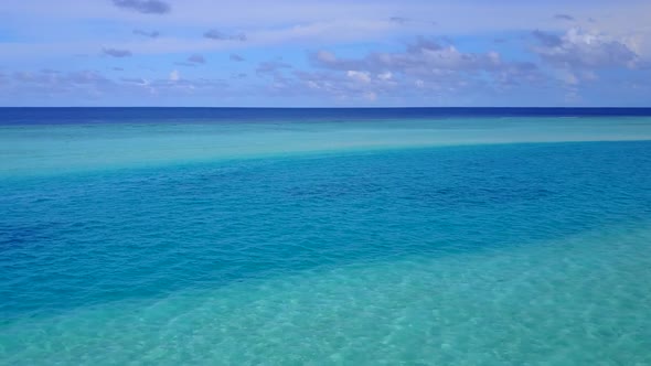 Drone abstract of marine coast beach time by clear ocean with sand background