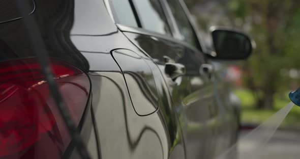 Washing a Black Car with Waterjet 