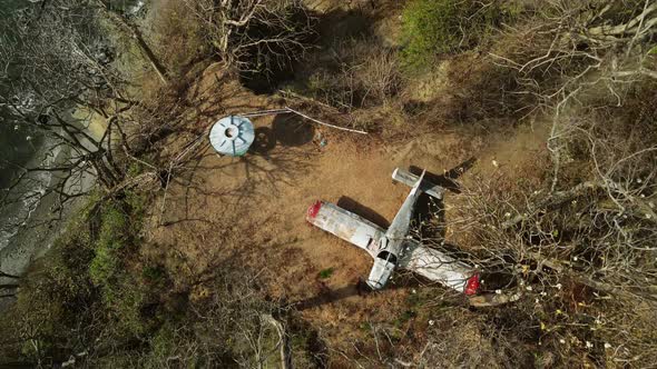 Abandoned small airplane stuck on the top of a hill by the coast in Costa Rica, province of Guanacas