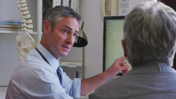 Doctor examining a senior woman in a retirement home