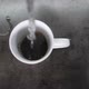Pouring Hot Water in Slow Motion on Grounded Coffee Crystals in a White Ceramic Cup and Brewing - VideoHive Item for Sale