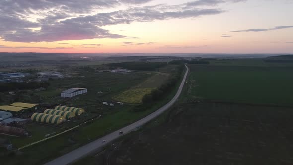 Aerial view of the Cars drive along the road