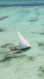 Vertical Video Boats in the Ocean Near the Coast of Zanzibar Tanzania