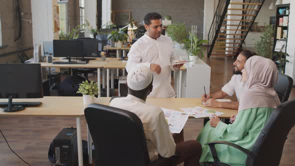 Diverse Colleagues Meeting in Office