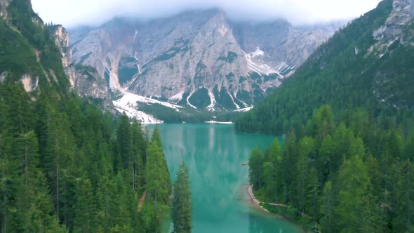 Beautiful Landscape of Braies Lake Lago Di Braies Romantic Place with Wooden Bridge and Boats on the