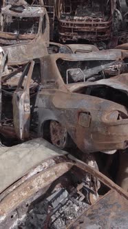 Vertical Video of a Dump of Destroyed Cars During the War in Ukraine