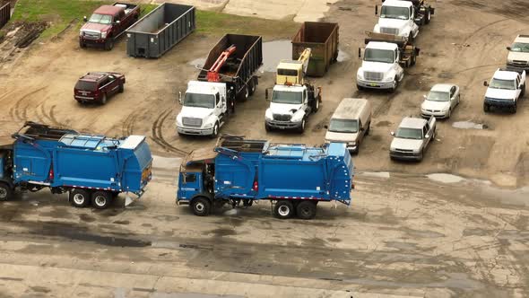 Blue Garbage Trash Trucks Shot With Aerial Drone