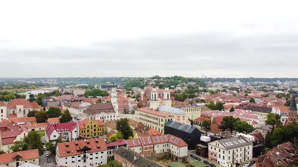 Majestic rooftops of Kaunas old town, aerial flying forward view