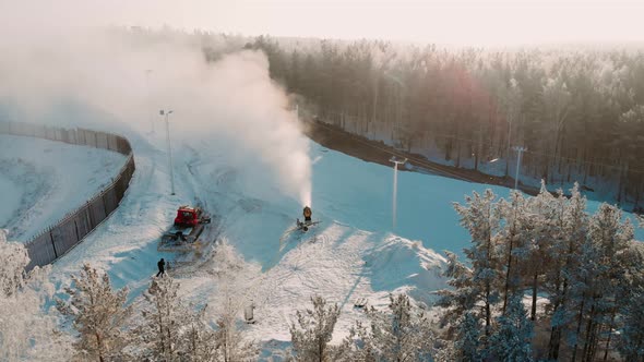 Aerial View Snow Cannon Sprays Water and Makes Snow