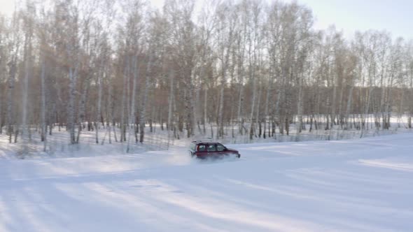 Сar overcoming snow hummocks