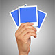 Polaroids in Hand Mock-Up - GraphicRiver Item for Sale