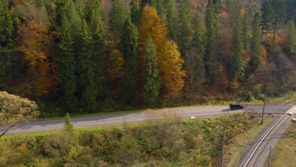 View From the Height on the Autumn Landscape - Car Rides on the Road, Stops Before the Railway