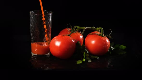 Fresh Tomato Juice Being Poured Into a Glass