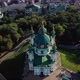 Aerial View of St. Andrews Church, Orthodox Church on Green Hill in the City - VideoHive Item for Sale