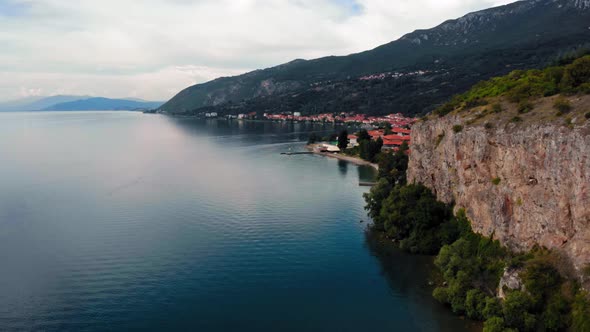 Aerial shot of Macedonia coast. Clif and beautiful water around Ohrid Lake in Southern Europe.