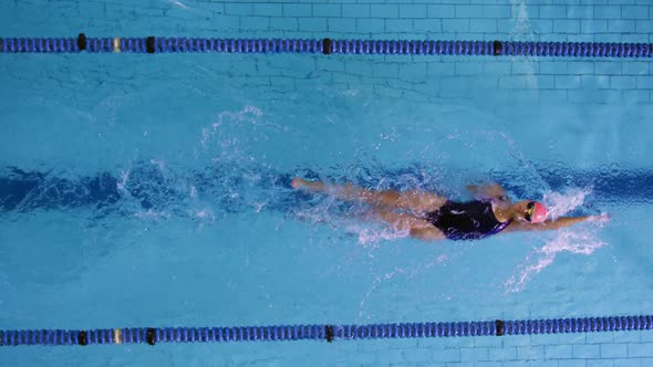 Swimmer training in a swimming pool