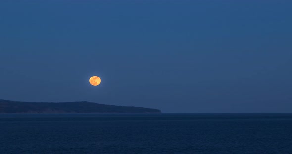 Rising Moon Over the Seashore