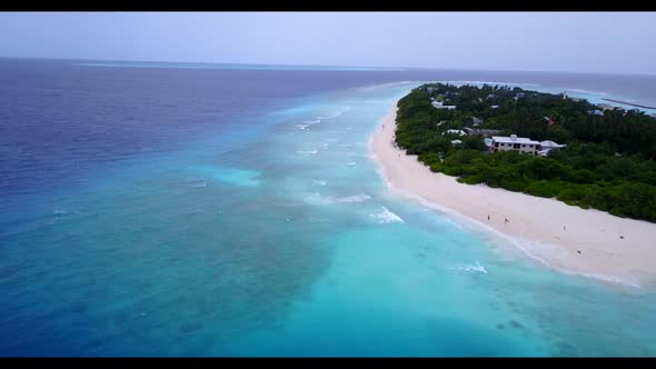 Aerial view travel of tranquil coast beach vacation by transparent ocean with white sandy background