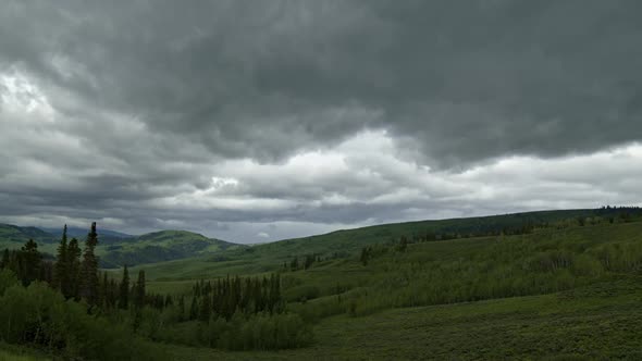 Time lapse of storm moving over mountain forest in Wyoming