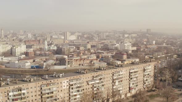 Flying Over the Roof of One of the Houses of the City of Kharkov, on Which a Couple Man and Woman