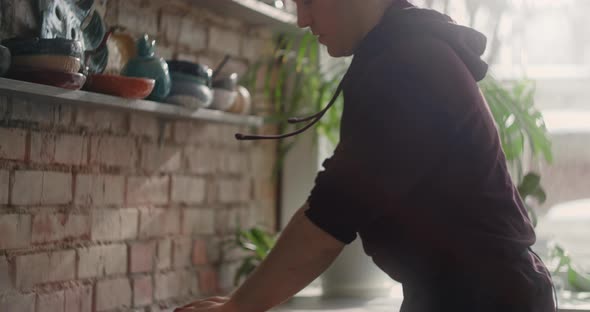 Potter Kneads Clay with Dye in Slow Motion Pottery at Workshop Potter Prepares Clay for Making