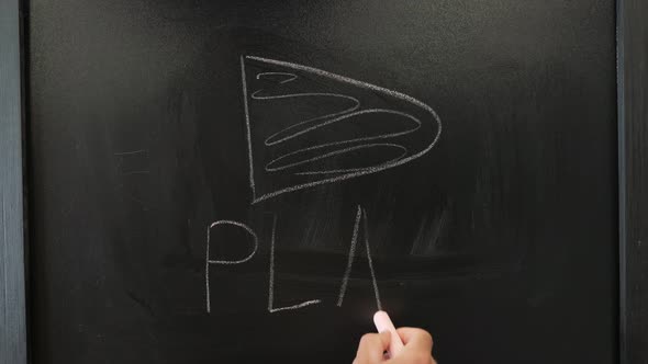 Sign "Play" written on black board.